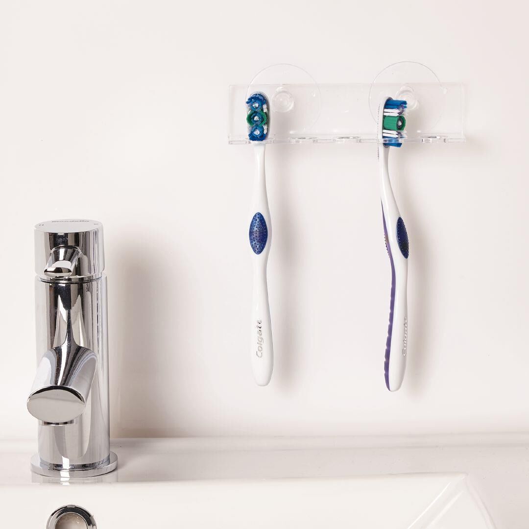 Suction toothbrush hot sale holder